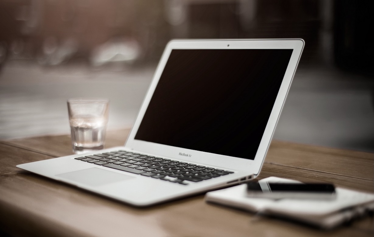 Professional technician working on MacBook repair